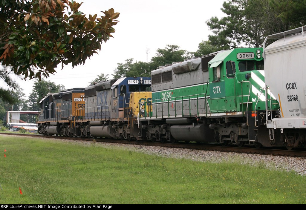 A trio of SD40-2s waits for green
